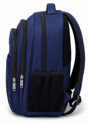 Side view of the navy blue Wires school backpack showing layered zip compartments, a shoulder strap and a mesh pocket.