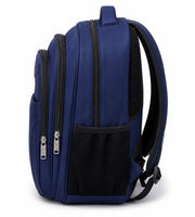 Side view of the navy blue Wires school backpack showing layered zip compartments, a shoulder strap and a mesh pocket.
